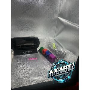 Black psp 1000 w/charger & new battery
